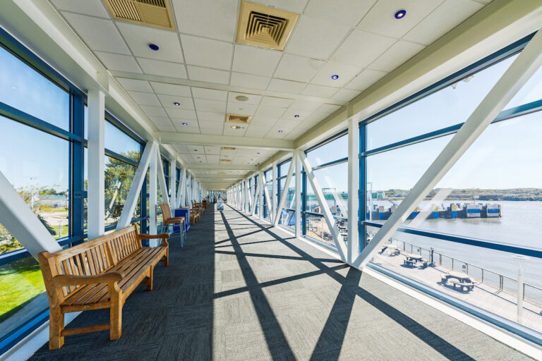The skywalk that leads to the Ferry passenger loading area with the Security Check ahead.