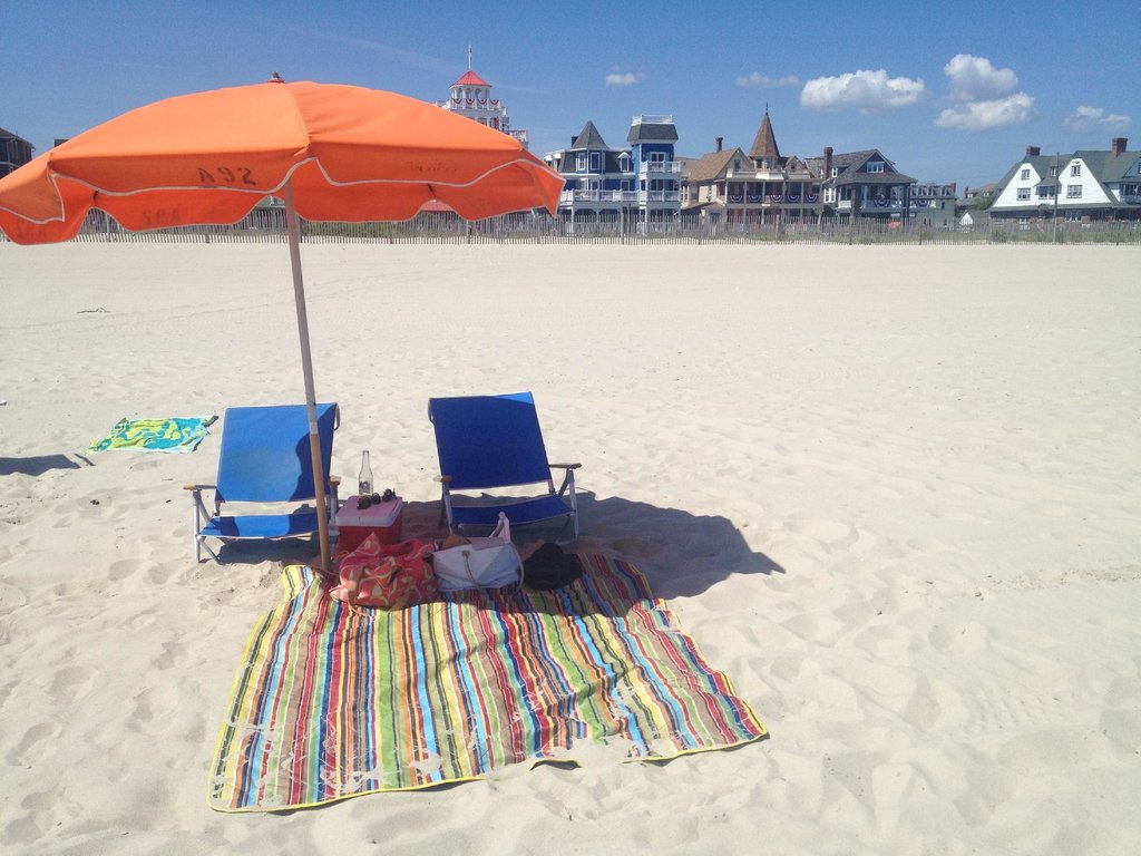 Beach umbrellas and blanket on the beach in Cape May